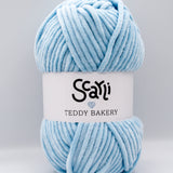 Teddy Bakery chenille yarn in shade baby blue light blue. Soft chunky plush yarn