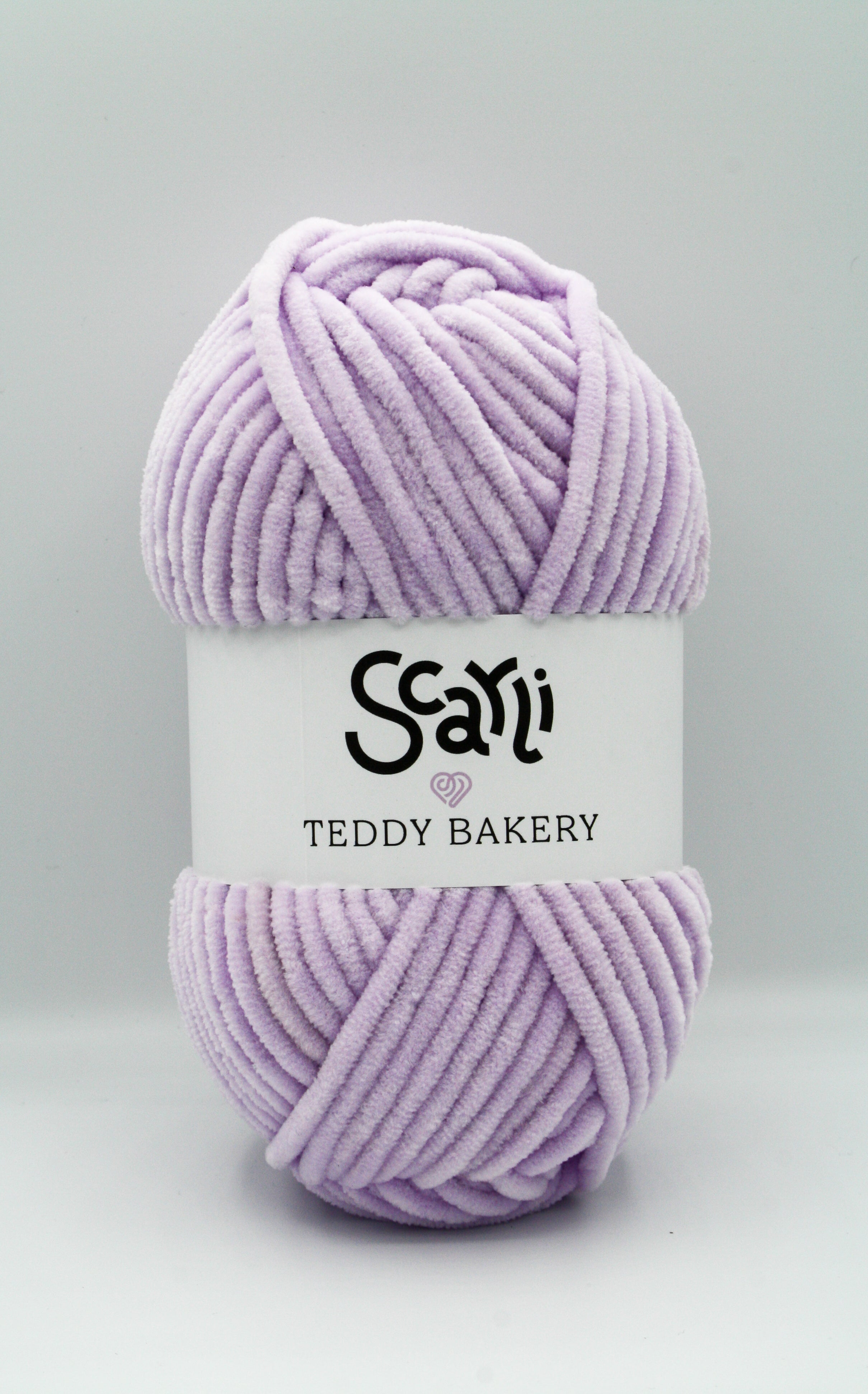 Teddy Bakery chenille yarn in shade lilac light pastel purple. Soft chunky plush yarn