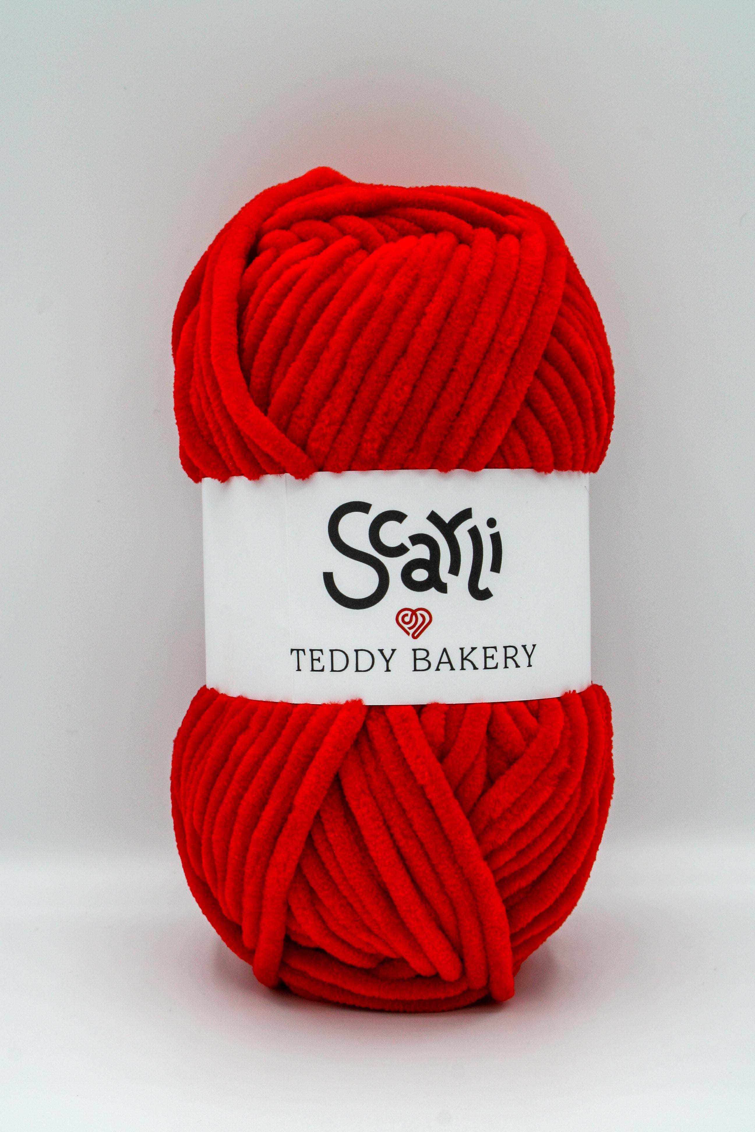Teddy Bakery chenille yarn in shade poppy bright red. Soft chunky plush yarn