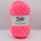 neon pink skein of chenille plush yarn scarli teddy bakery strawberry