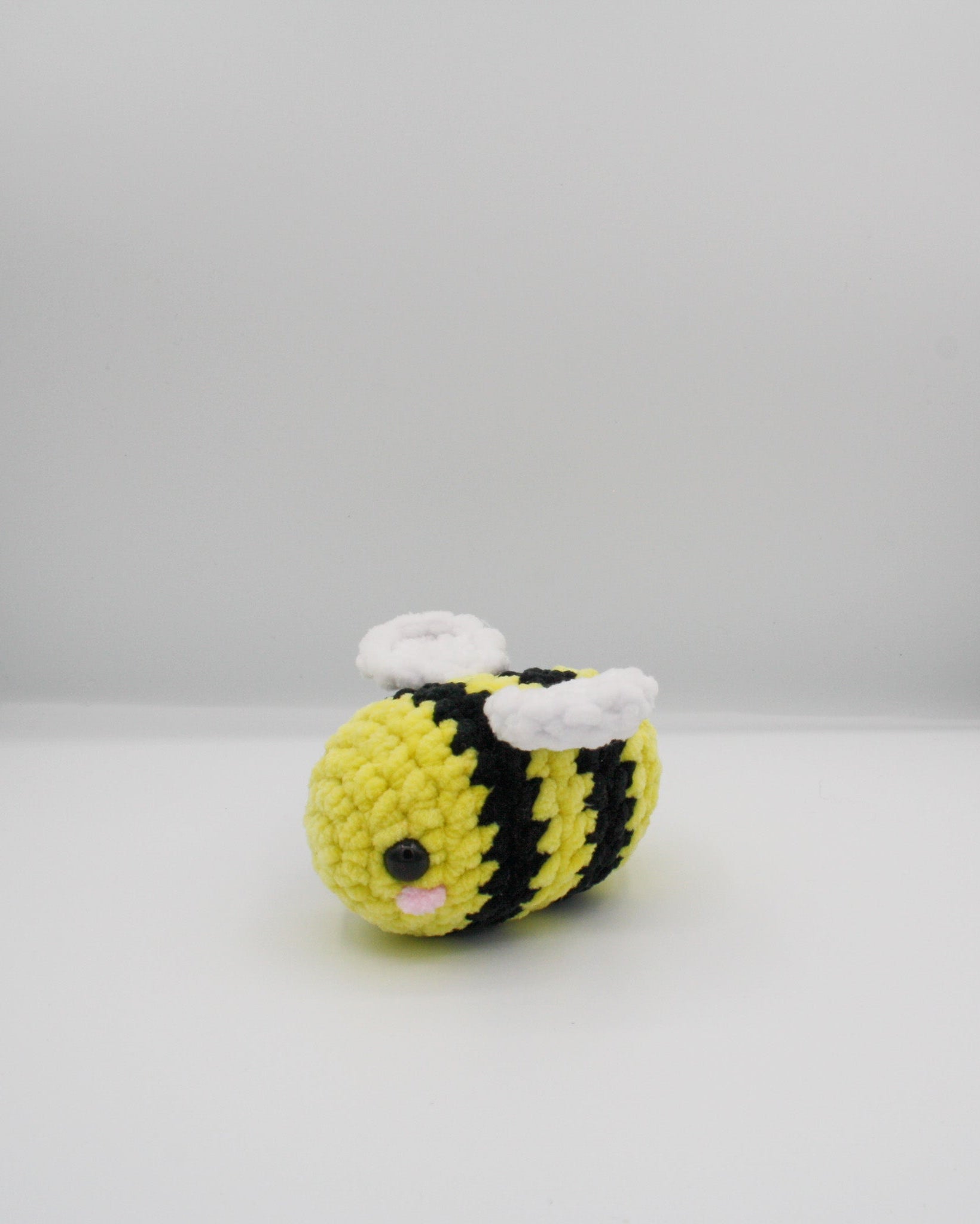 amigurumi benny the bee plushie made with chenille yarn