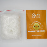 beginner crochet kit charli the chick pamphlet with written and video tutorials, and stuffing.