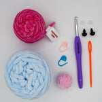 beginner crochet kit Ozzy the octopus materials including tester yarn, octopus chenille yarn, stitch markers, darning needle, safety eyes, and crochet hook.