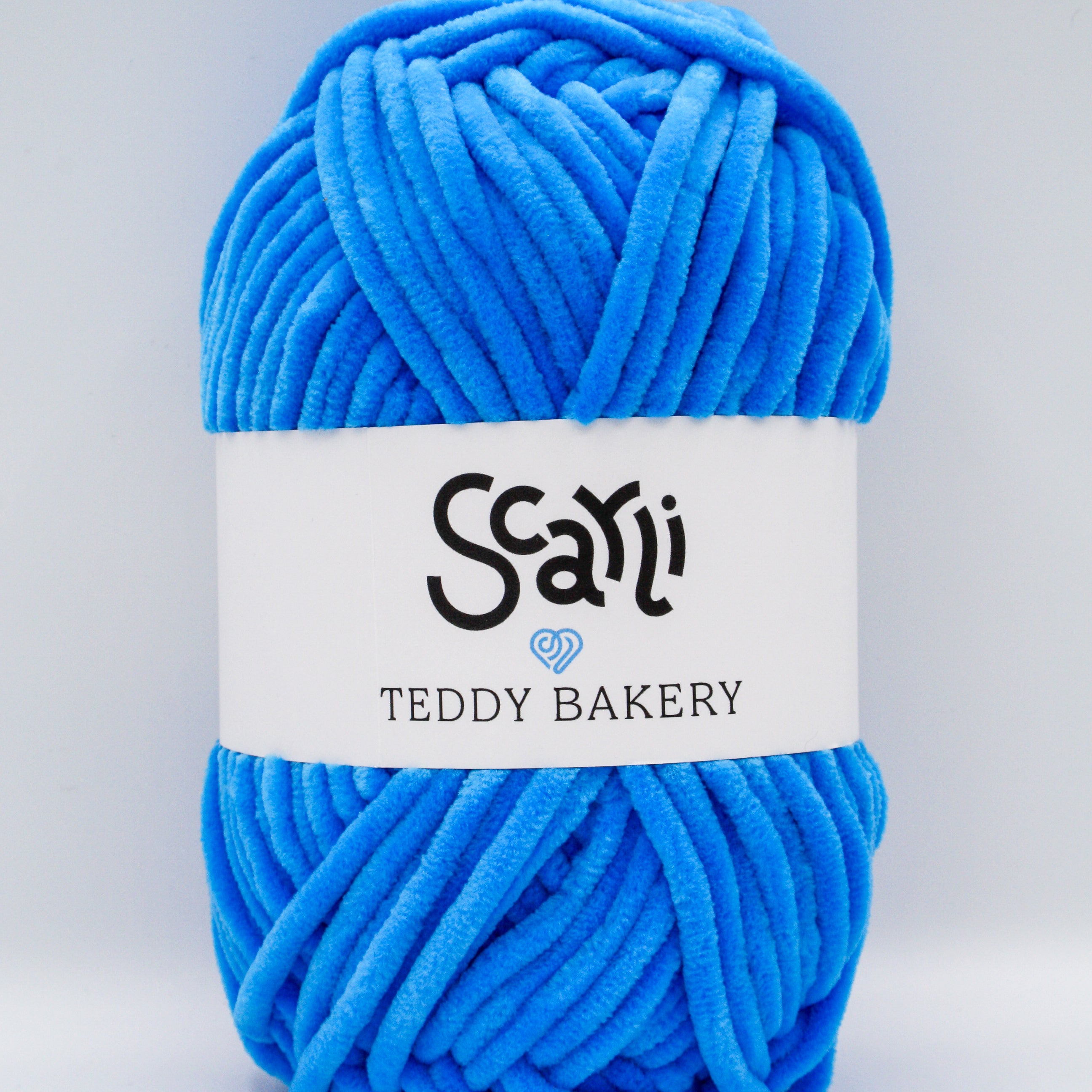 Teddy Bakery chenille yarn in shade sapphire bright blue. Soft chunky plush yarn