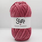 skein of rose pink chenille plush yarn teddy bakery scarli