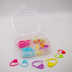 clover quick locking stitch markers. Small, medium and large size4d plastic stitch markers for crochet and knitting. Colours pink, green, blue, red, purple and yellow. Includes box for storage