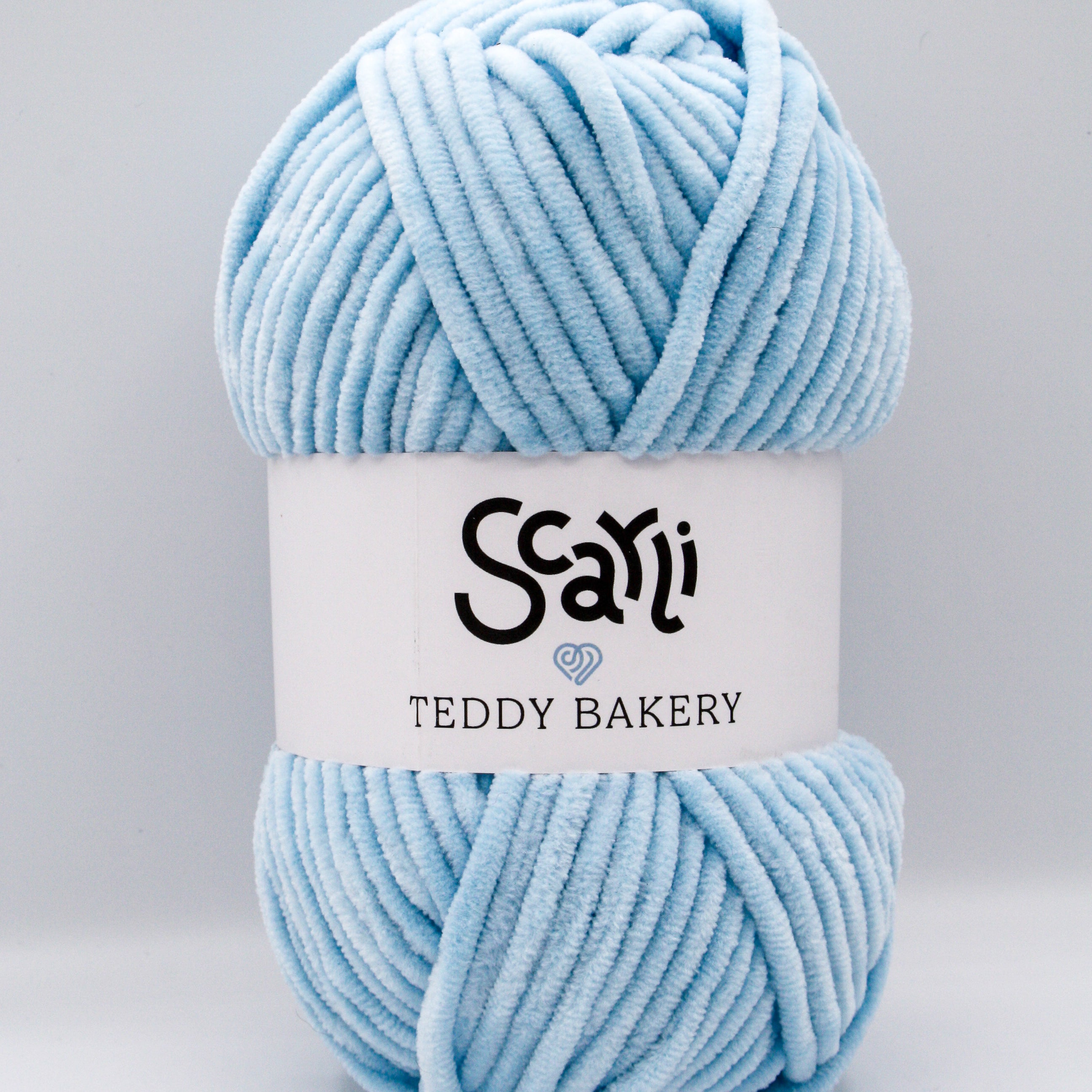 Teddy Bakery chenille yarn in shade baby blue light blue. Soft chunky plush yarn