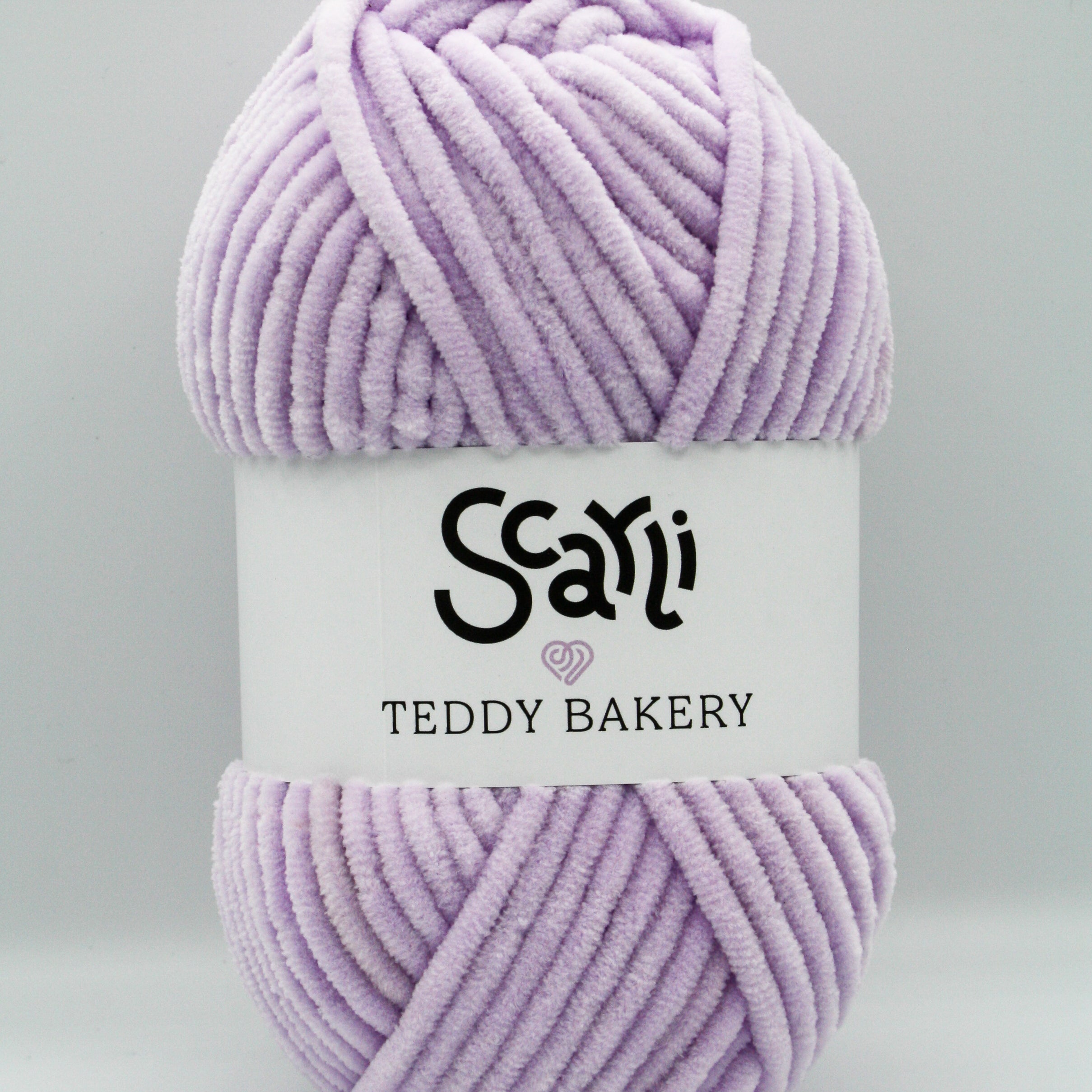 Teddy Bakery chenille yarn in shade lilac light pastel purple. Soft chunky plush yarn