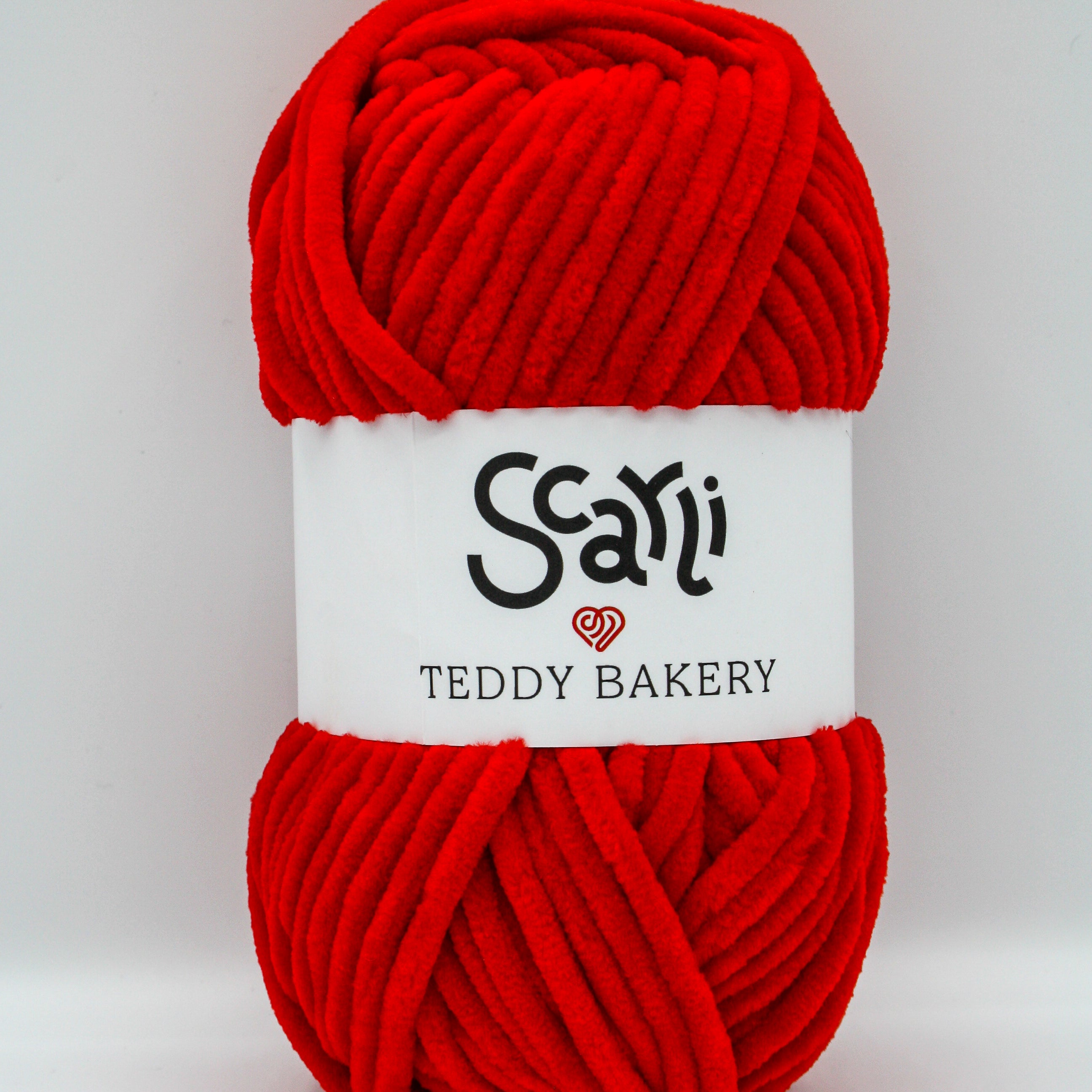 Teddy Bakery chenille yarn in shade poppy bright red. Soft chunky plush yarn