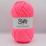 neon pink skein of chenille plush yarn scarli teddy bakery strawberry